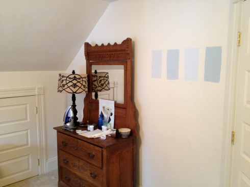 Choosing a paint color. We went with Benjamin Moore's "Constellation," ironically. 